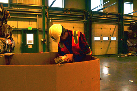 Bill sorting and culling the books